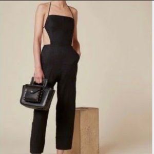 Black reformation pant suit with lace up back